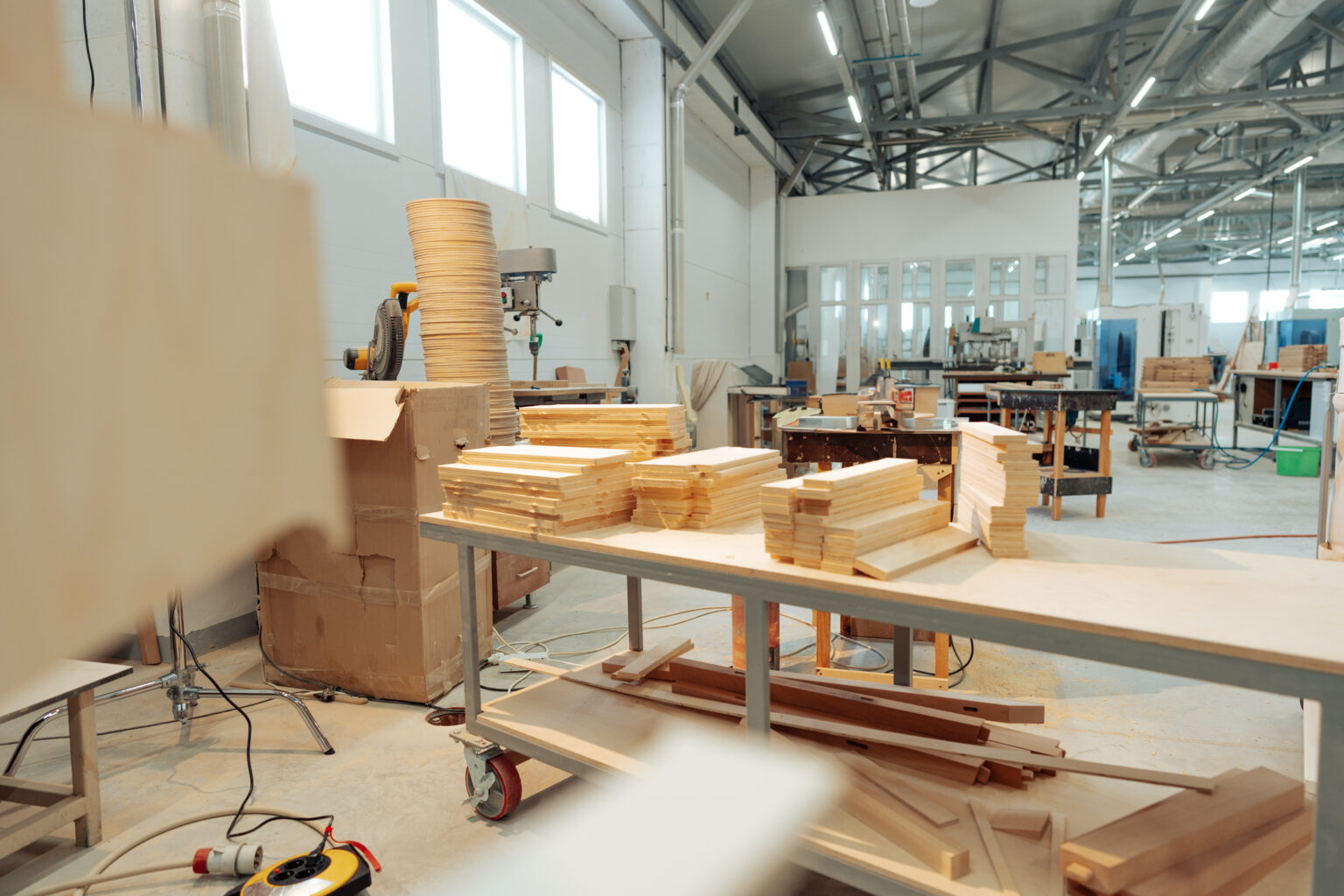 Interior of large workshop of contemporary furniture factory background